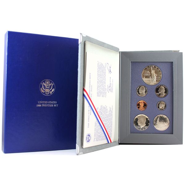 USA 1986 7-Piece Prestige Set. Includes $1 Liberty .900 Silver Proof Coin. 