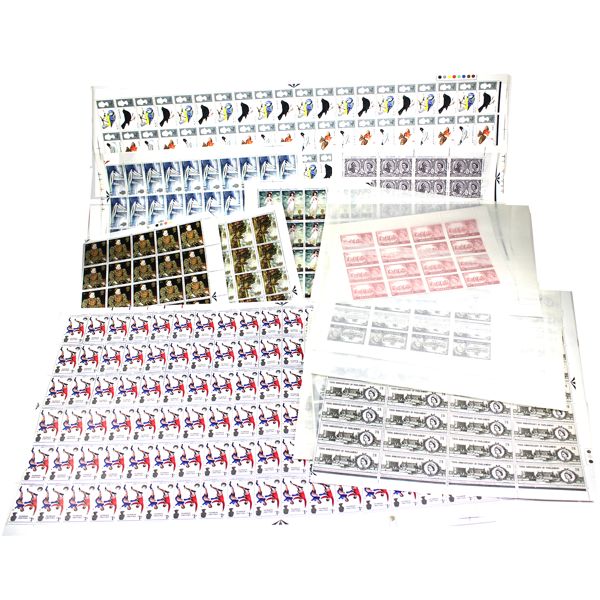 Lot of MNH United Kingdom mixed denomination stamps including 3x Canada First day Covers