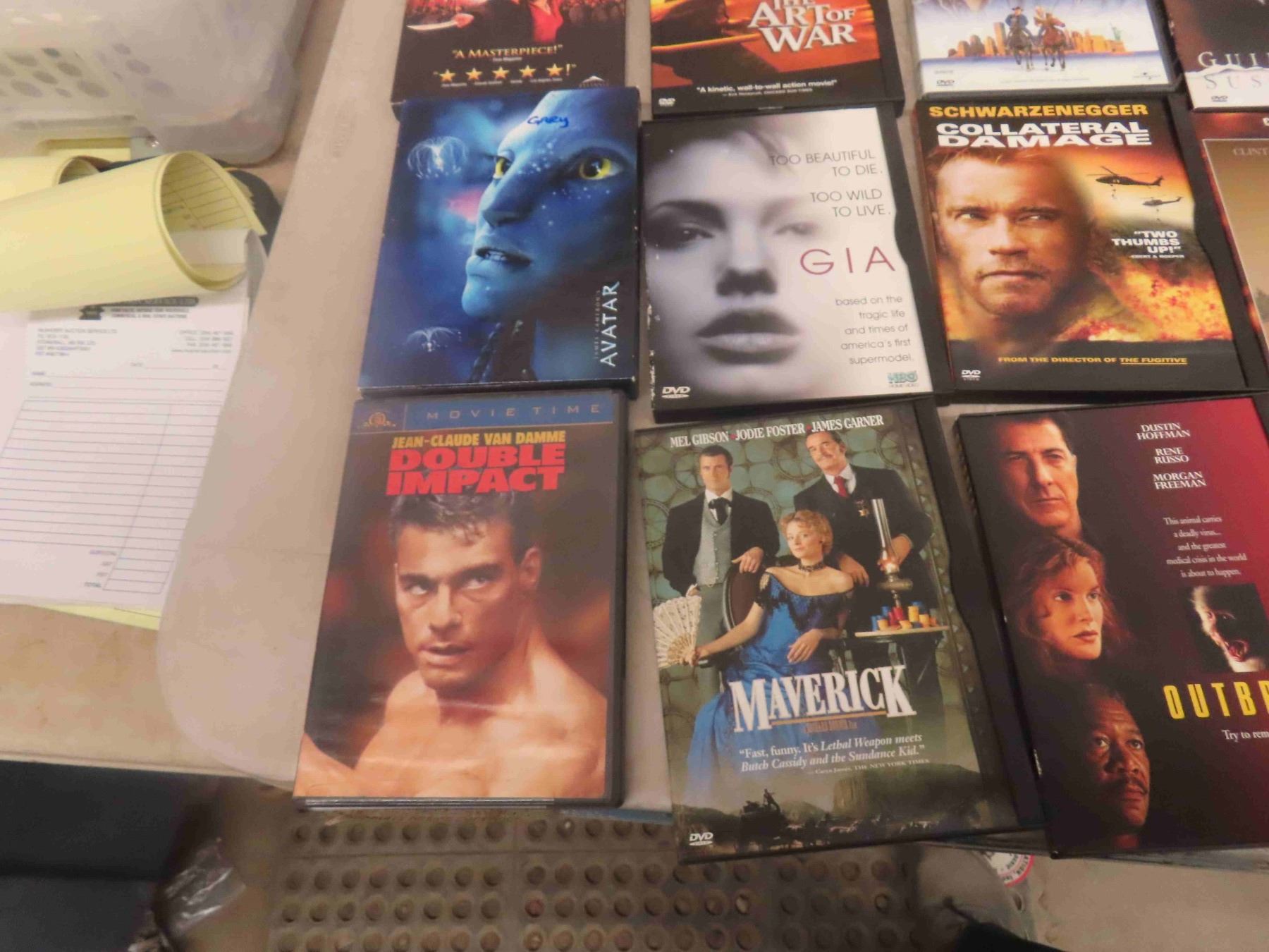 DVD Player + 20 DVD Movies McSherry Auction Service Ltd.