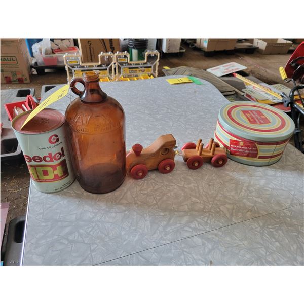 1- Quart of oil (full), glass jug, wooden train & tin