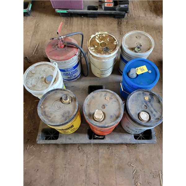 8- Various partial pails of oil