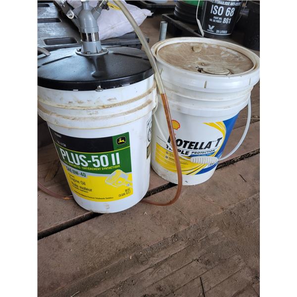 Full pail of Rotella 15W-40 & empty pail c/w pump