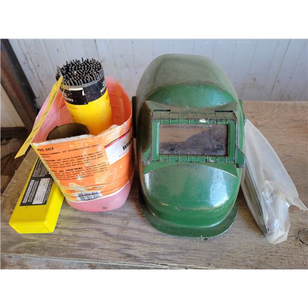Qty of welding rod alloy 60-13 & green welding helmet
