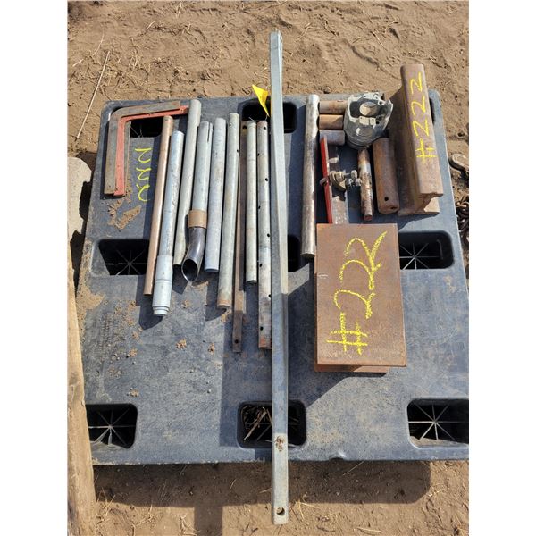 Pallet of steel, pipe, rails