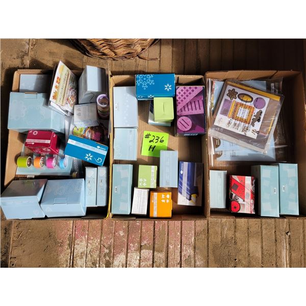 3- boxes of photo album & scrapbook supplies, ribbon, punches, tape runner, embellishment's etc.