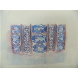 Tanzanite and Diamond Lady's Ring, 14 K yellow gold- tanzanite are oval, faceted, approx. 1.00 carat