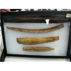 Lot of 4 ivory and bone artifacts (74)