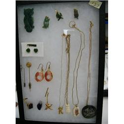 Lot of: scrimshawed baleen pendant, scrimshawed ivory pendant, carved ivory owl pendant, gold nugget