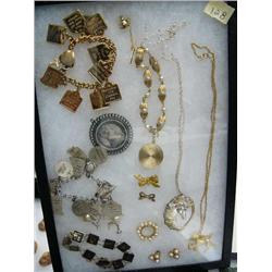 Lot of: charm bracelet from Indiana, 2 unicorn pendants, 2 gold nugget bow pins, gold charm bracelet