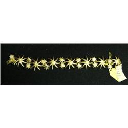 Lady's bracelet with star fish with many diamonds, 14 K gold, has 56 diamonds- retail value $1,475 (