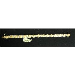 Gold and diamond bracelet- replacement value $1,700 (3)