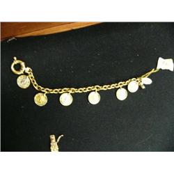Charm bracelet with gold coins, 18 K gold- retail value $500 (3)