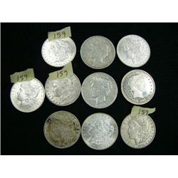 Lot of 9 silver dollars and 1 trade dollar- 1887 extra fine Philadelphia, 1897 made in Philadelphia,