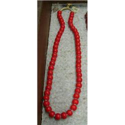 26" strand of red trade beads with white centers (3)