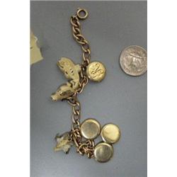7" charm bracelet/locket with 3 carved ivory pieces and 3 letter R engraved locket pieces- carved iv