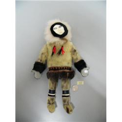 Seal skin doll done by Maria Anariak with ivory face