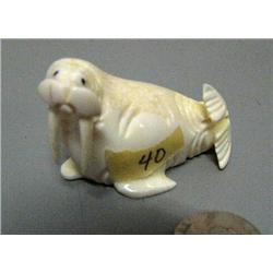 Carved walrus from core ivory done by AHS - 2-3/4" and 1-1/4" tall