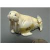 Image 1 : Carved walrus from core ivory done by AHS - 2-3/4" and 1-1/4" tall