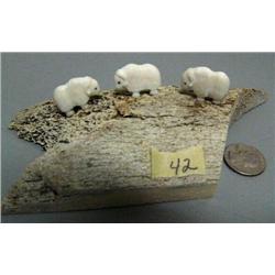 3 carved ivory musk ox mounted on bone