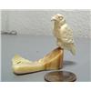 Image 1 : Carved ivory eagle mounted on fossilized ivory- 2" tall