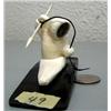 Image 2 : Carved ivory hunter in kayak with stone face mounted on baleen- baleen base is 4-3/4" x 1-1/2", figu
