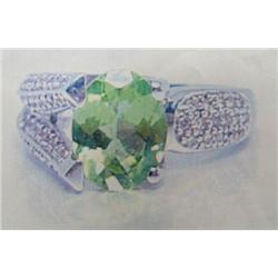 Peridot and Diamond Lady's Ring, 14 K white gold- Peridot is oval, faceted, approx. 2.00 carats, tra