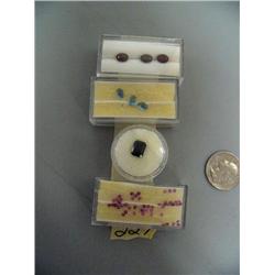 Lot of 4 gem stones- rubies, sapphire, topaz, and garnets