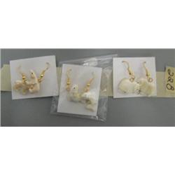 Lot of 3 pairs of carved ivory earrings made by R. B. Kokuluk- musk ox, salmon, polar bear
