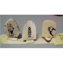 Lot of 3 scrimshawed ivory platchets individually mounted on ivory- hunter, girl in parka, walrus
