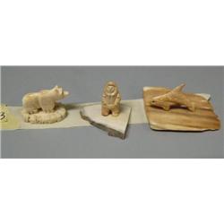 Lot of 3 carved ivory pieces individually mounted on ivory- bear, man, Orca