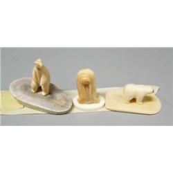 Lot of 3 carved ivory pieces mounted individually on ivory- standing bear, walrus, bear