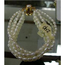 Multi-strand genuine pearl bracelet