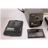 Image 2 : (9) Misc. Items: calculators, soduko games, pencil sharpener (not working), etc.