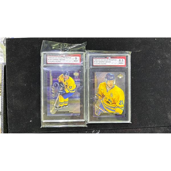 KSA 9 1999-00 UD GOLD RESERVE #165 DANIEL SEDIN YOUNG GUNS & KSA 8.5 1999-00 UD GOLD RESERVE #166