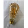 Image 3 : Dicuno warm amber coloured light bulb