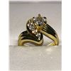 Image 1 : Ladies Solitaire .50 Carat with side stones Swirl Shank Style Ring