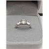 Image 1 : GRA CERTIFIED MOISSANITE VVS D WEIGHING AN ESTIMATED 1.00 CARAT WITH A CUBIC ZIRCONIUM ON EITHER SID