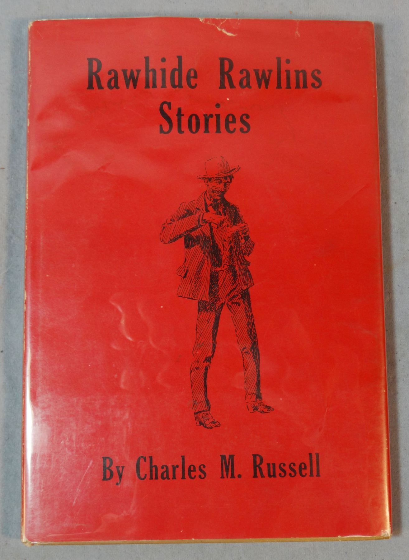 Rawhide Ranch Books 2 books by Russell, C.M.: Rawhide Rawlins Stories, 1946, 1st revised ed ...
