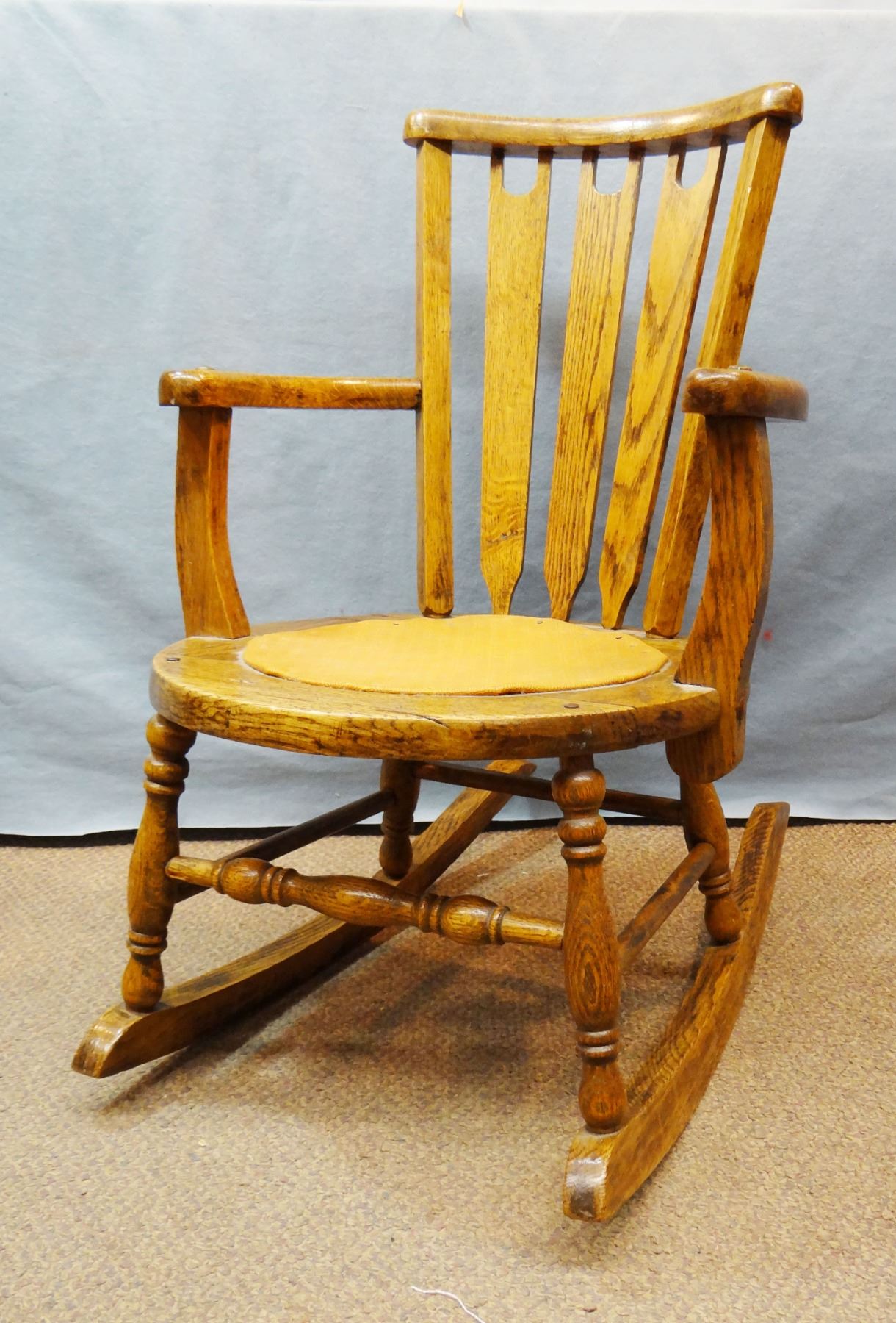 Oak child's rocker, 26
