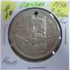 Image 1 : 1958 BC TOTEM POLE (HOLE) CANADA SILVER DOLLAR