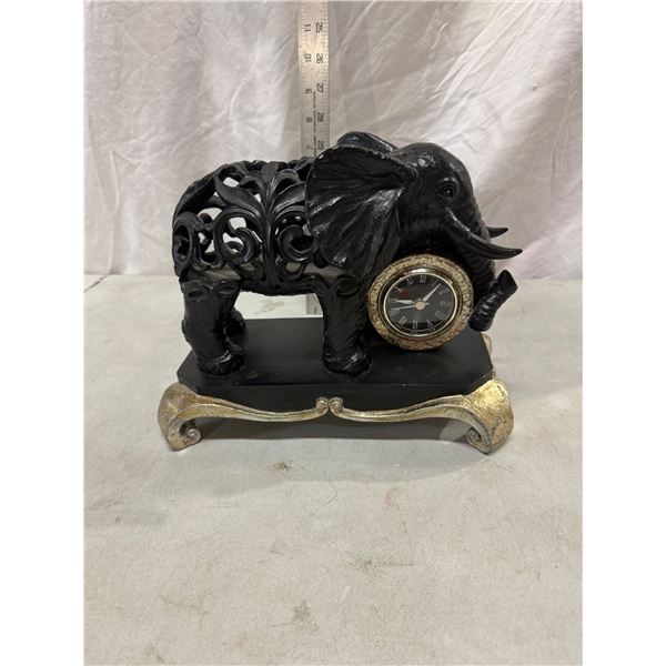 Carved elephant clock