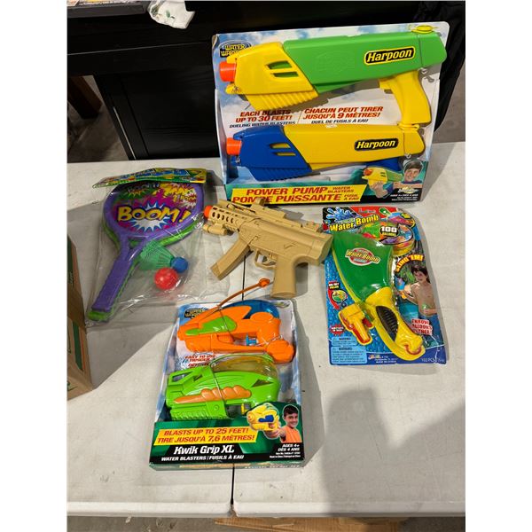 Water guns and other toys