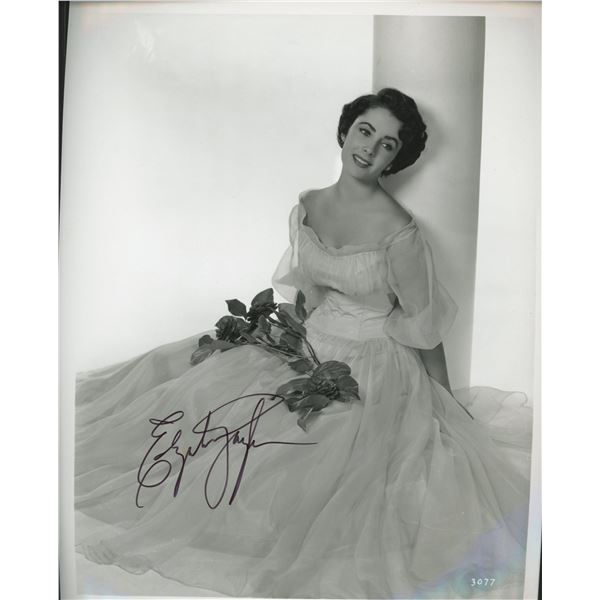 Elizabeth Taylor signed photo. GFA Authenticated