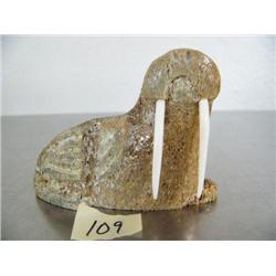 Bone carving of walrus with ivory tusks 2-1/2" high and 3" long  by Slwooko ()