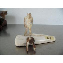 All ivory scene of hunter and bear coming out of its cave by John Lappo done in 1985 ()