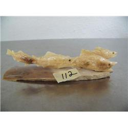 All ivory carving of salmon running up stream- imported, not Alaskan ()