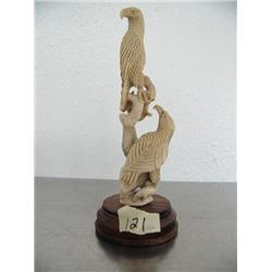 5" bone carving of 2 eagles on tree mounted on wood base outstanding quality- imported, not Alaskan 