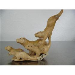 Group of 5 otters with one fish carved out of bone 6"- imported, not Alaskan ()