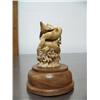Image 2 : 5" bone carving on wood base of four swimming whales- imported, not Alaskan ()