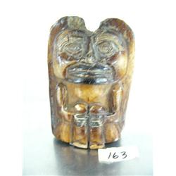 3-1/2" bone carved totem man ()